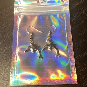 Silver dolphin earrings🐬